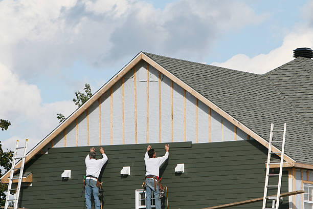 Professional Siding Installation technician working in Wingina, VA